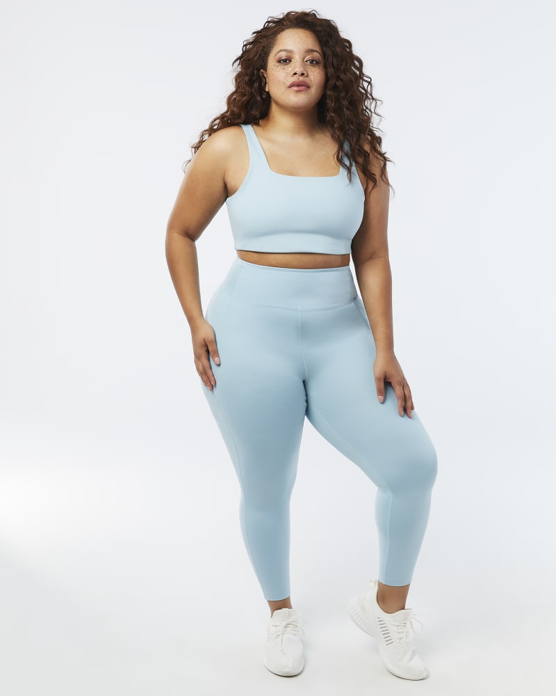 Plus size model with pear body shape wearing Mimi High-Rise Leggings by Girlfriend Collective | Dia&Co | dia_product_style_image_id:157472